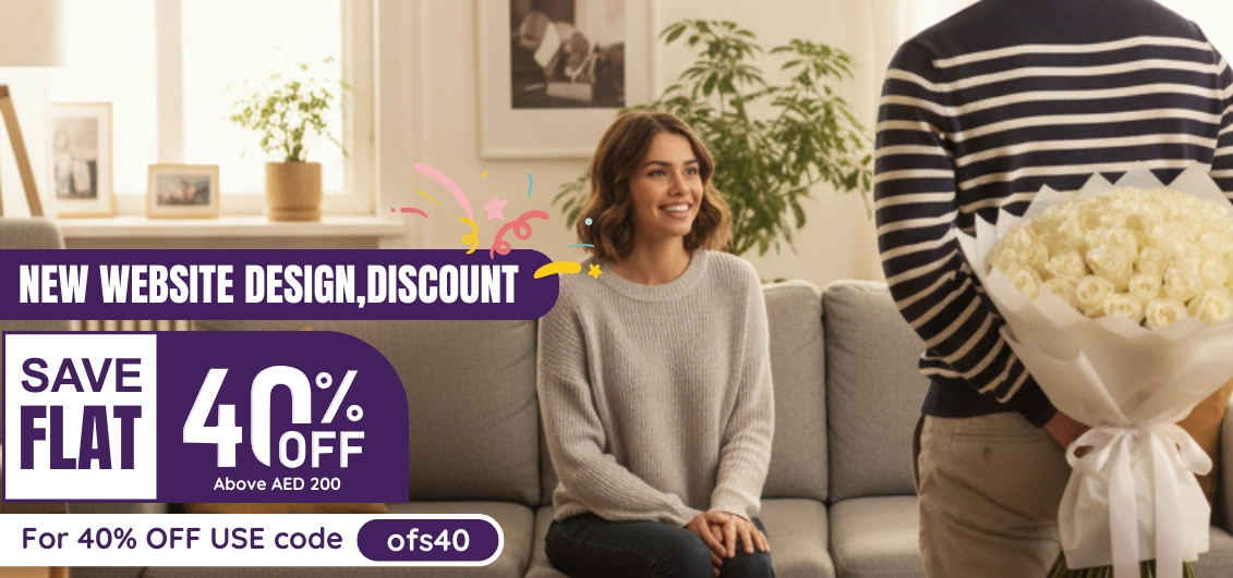 Pink roses in a glass vase with soft background bokeh